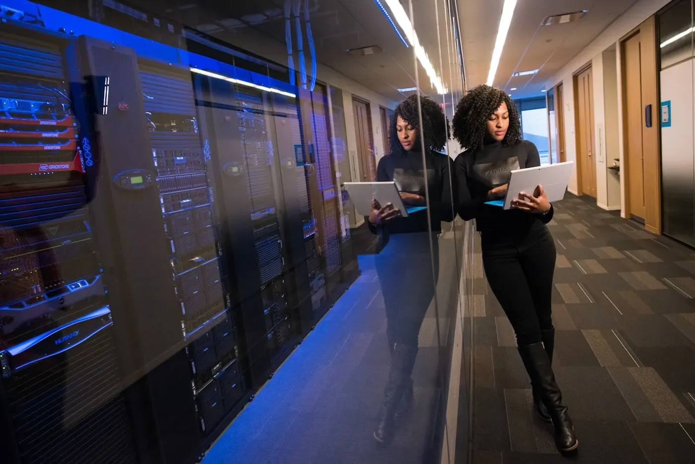 Marketing team reviewing campaign performance on a laptop
